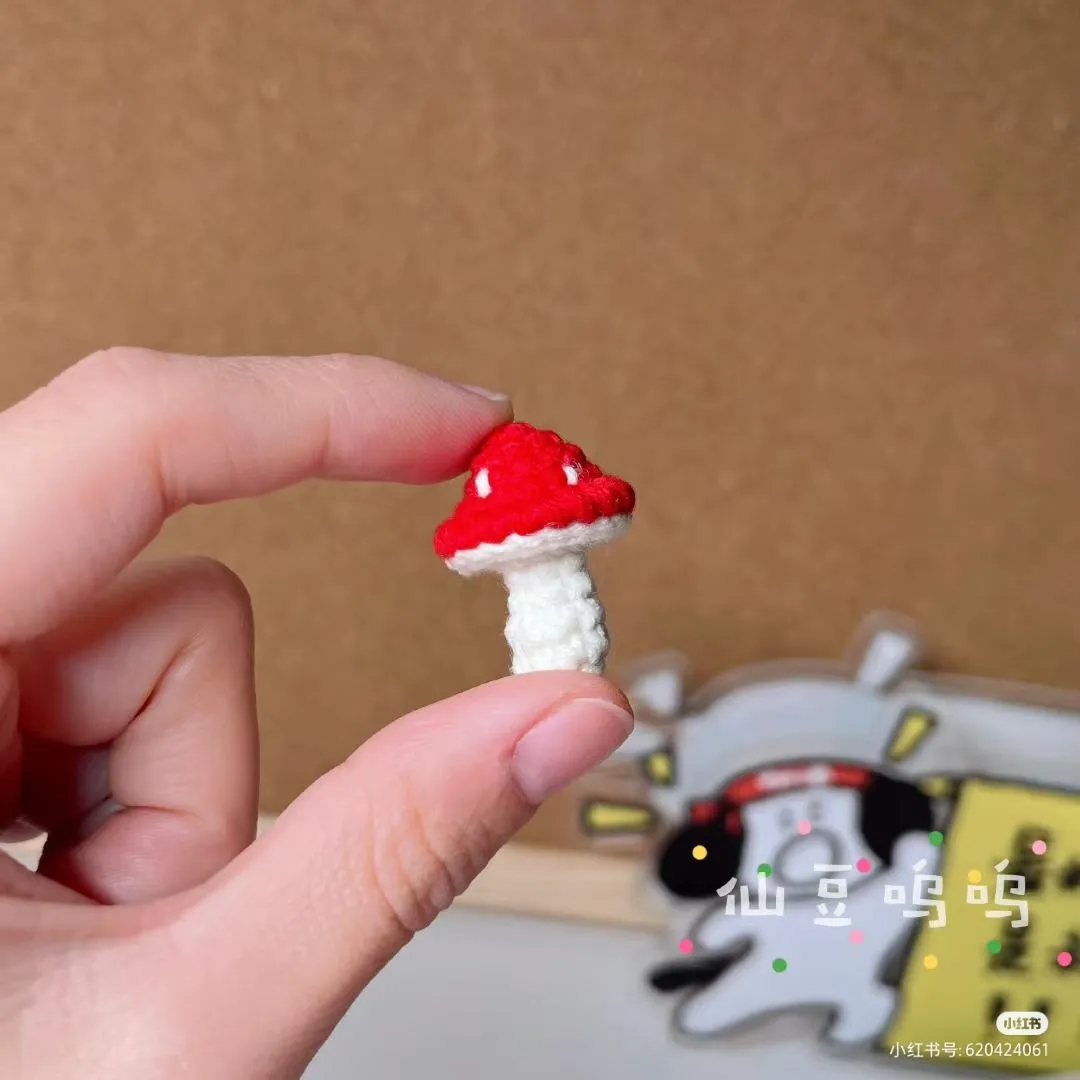 Free step-by-step amigurumi/plushies pattern for Tiny Crochet Fly Agaric Mushroom Charm for beginners.